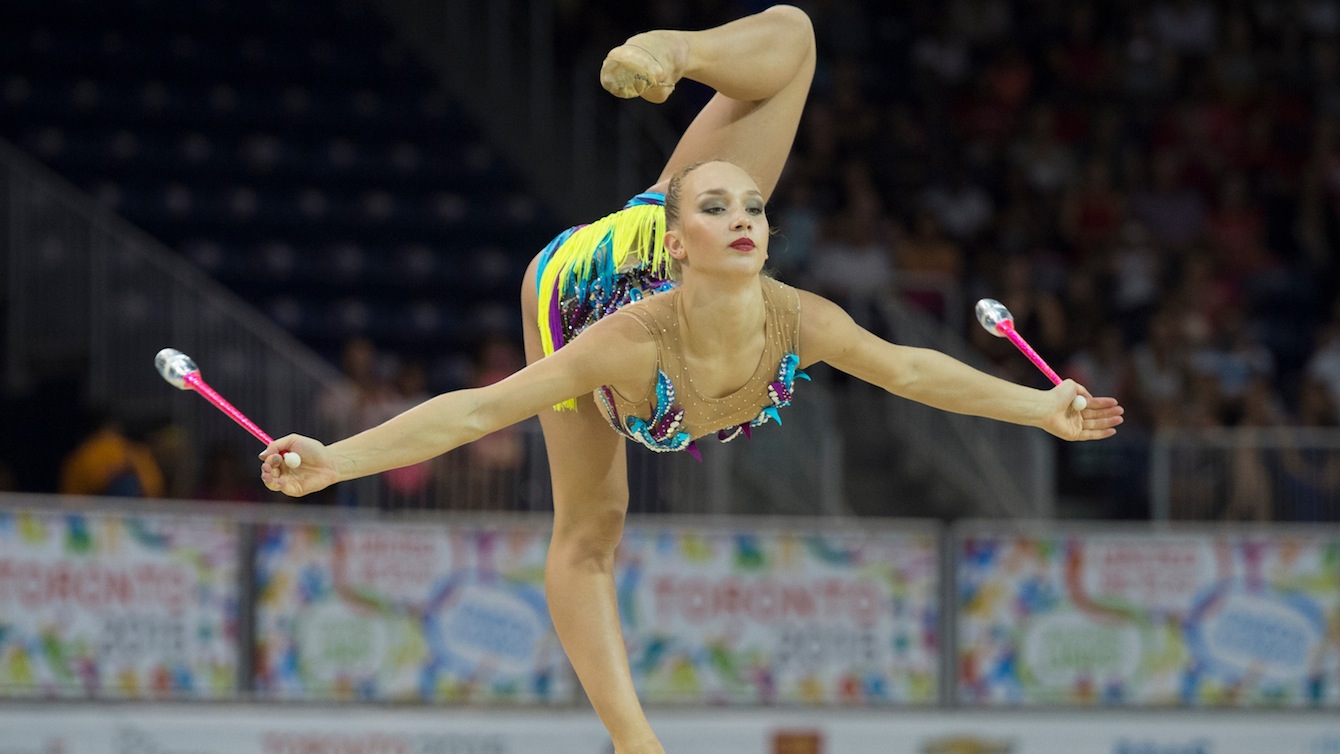 Patricia Bezzoubenko performs her clubs routine in Rhythm Gymnastics at the Pan American Games in Toronto, July 18, 2015. Photo by Jason Ransom