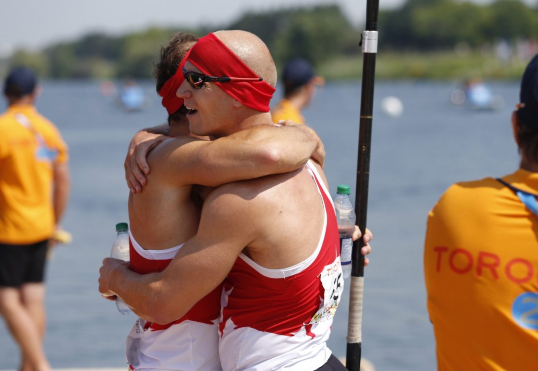 Canada's celebrates winning the C2 1000m at the Pan Am Games in Toronto Monday, July 13, 2015. COC Photo by Michael P. Hall
