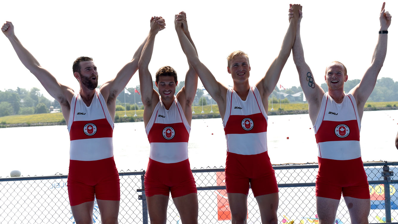 Conlin McCabe, Kai Langerfeld, Tim Schrijver and Will Crothers celebrate their Pan Am Games coxless four win on July 13, 2015