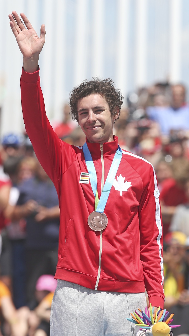 Sean MacKinnon with his medal