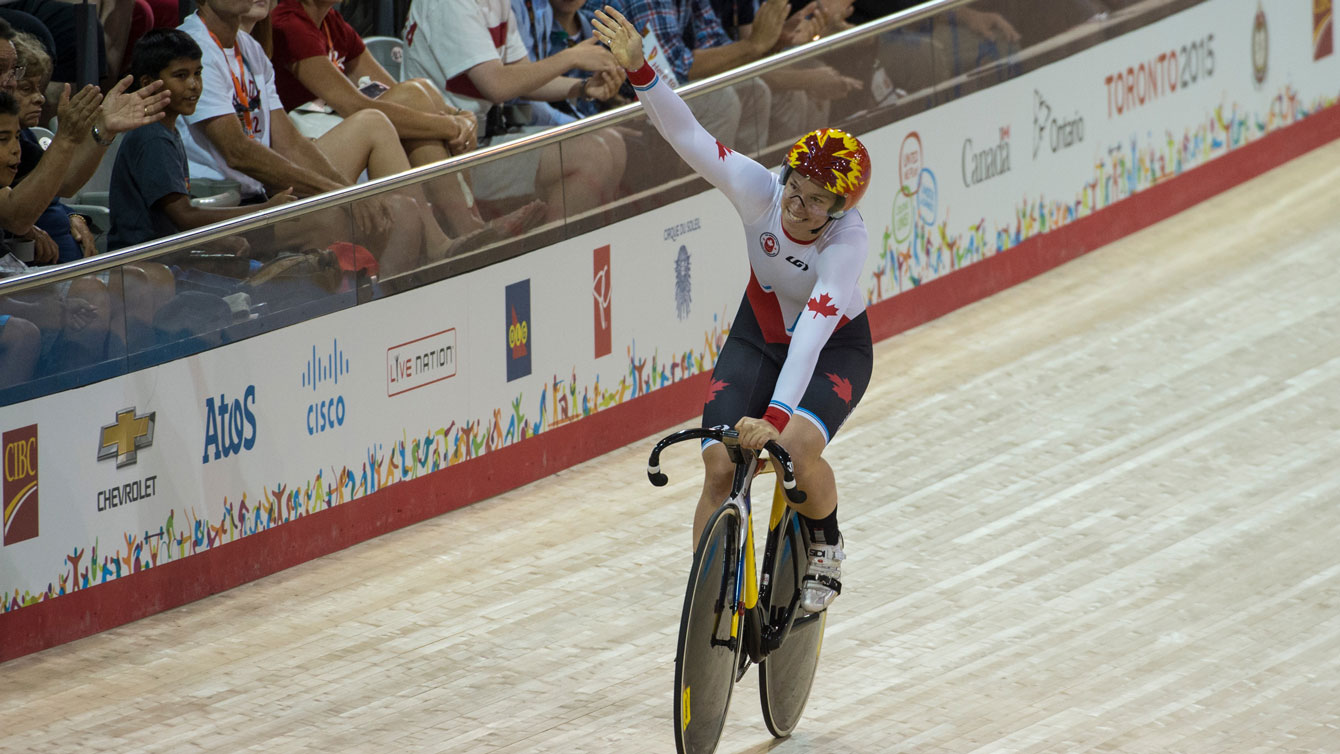 Monique Sullivan waves to the crowd after winning the Pan Am Games women's team sprint on July 16, 2015.