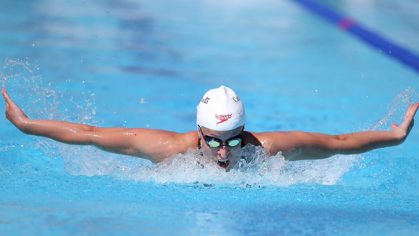 Canada's Katerine Savard swims during her women's 200-meter butterfly 