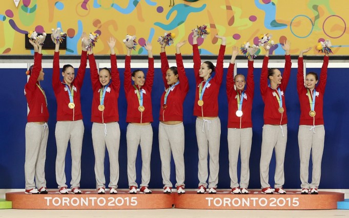 Team Canada wins the gold medal in Synchronized Swimming.
