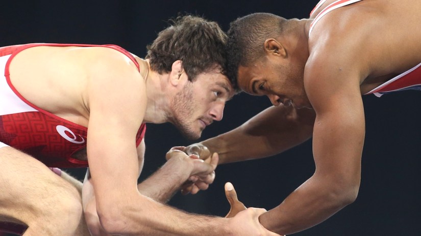 Tamerlan Tagziev (red) of Toronto competes in freestyle wrestling 86kg at the PanAmerican Games in Mississauga, Ont., Saturday, July 18, 2015. Photo by Mike Ridewood