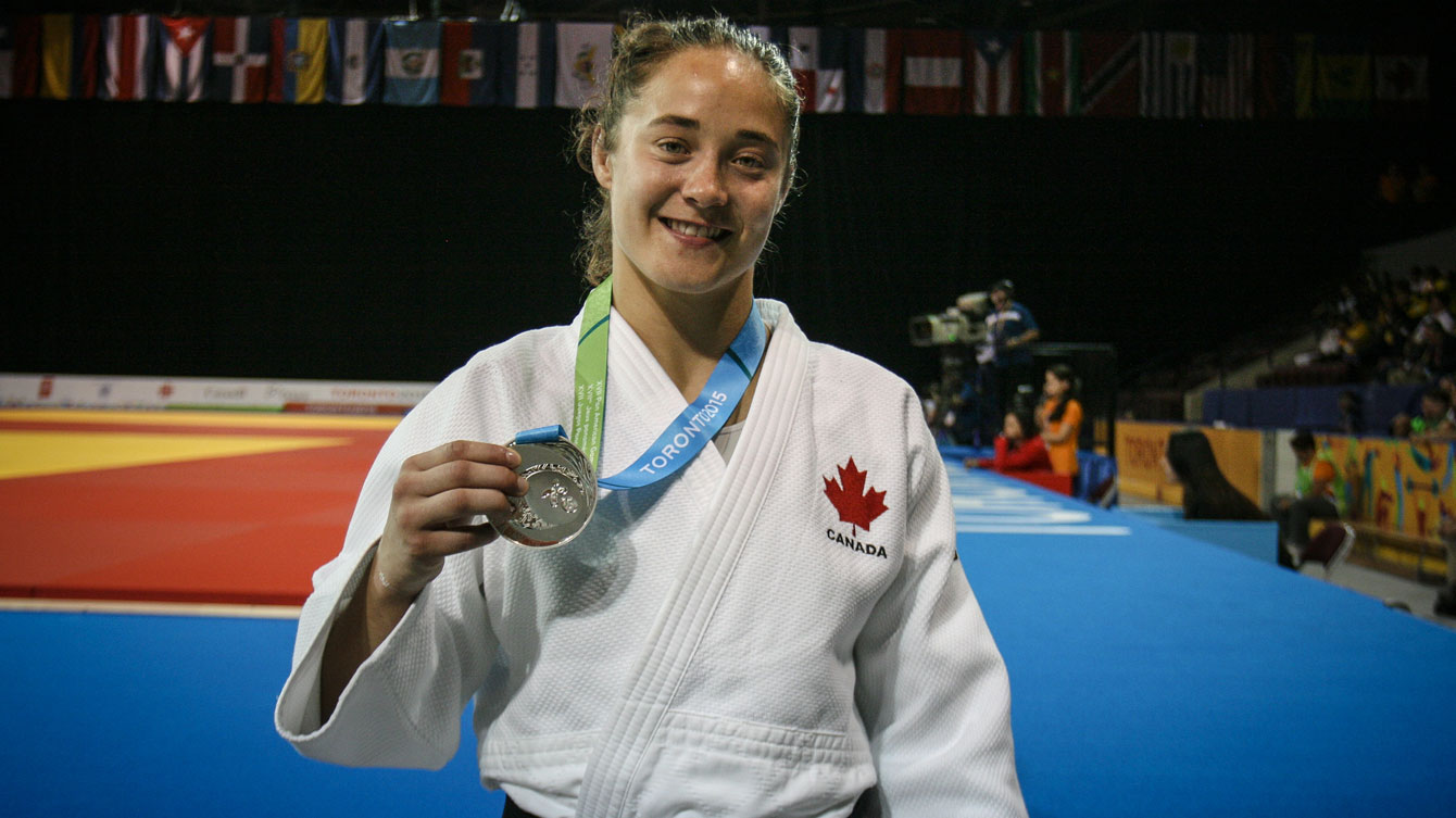 Stefanie Tremblay holds up her Pan Am Games silver medal on July 13, 2015. 