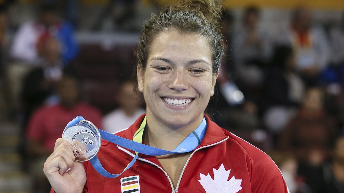 Justine Di Satsio (red) of Coquitlam, B.C. was the silver medalist