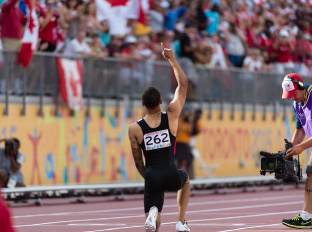 TO2015 - Andre De Grasse Andre De Grasse at TO2015 after winning the 200m (COC Photo by Winston Chow).