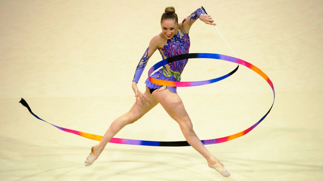 Carmen Whelan performs a ribbon routine in rhythmic gymnastics