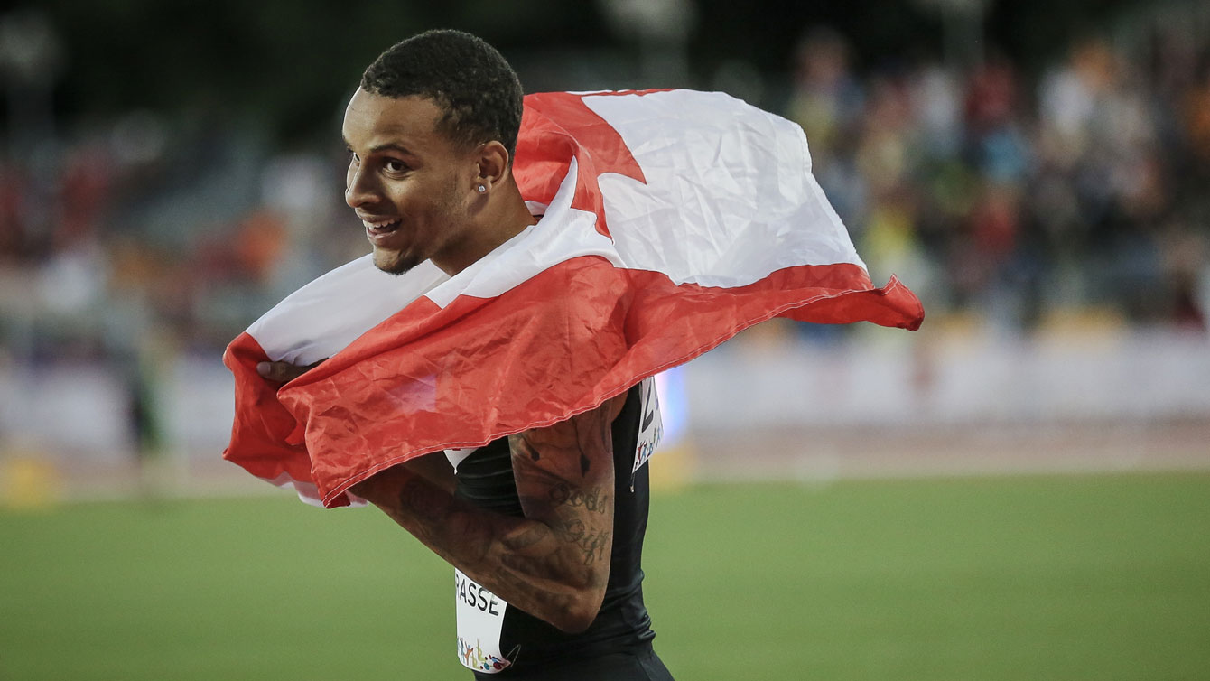 Andre De Grasse after winning TO2015 Pan Am gold in the 100m (Photo: Alexandra Fernando).