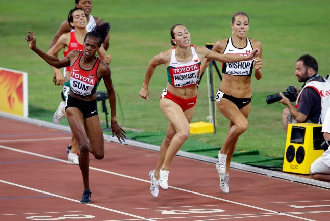 Bulgaria's Marina Arzamasova (centre) leans in ahead of Canada's Melissa Bishop (right) and Kenya's Eunice Sum at the IAAF World Championships in Athletics women's 800 metres final on August 29, 2015.