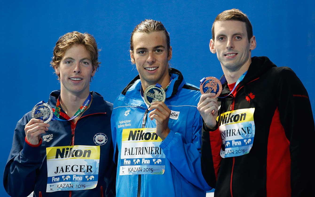 Canada's bronze medallist Ryan Cochrane (right), with Italy's winner Gregorio Paltrinieri (centre), and American Connor Jaeger who won silver (left).  