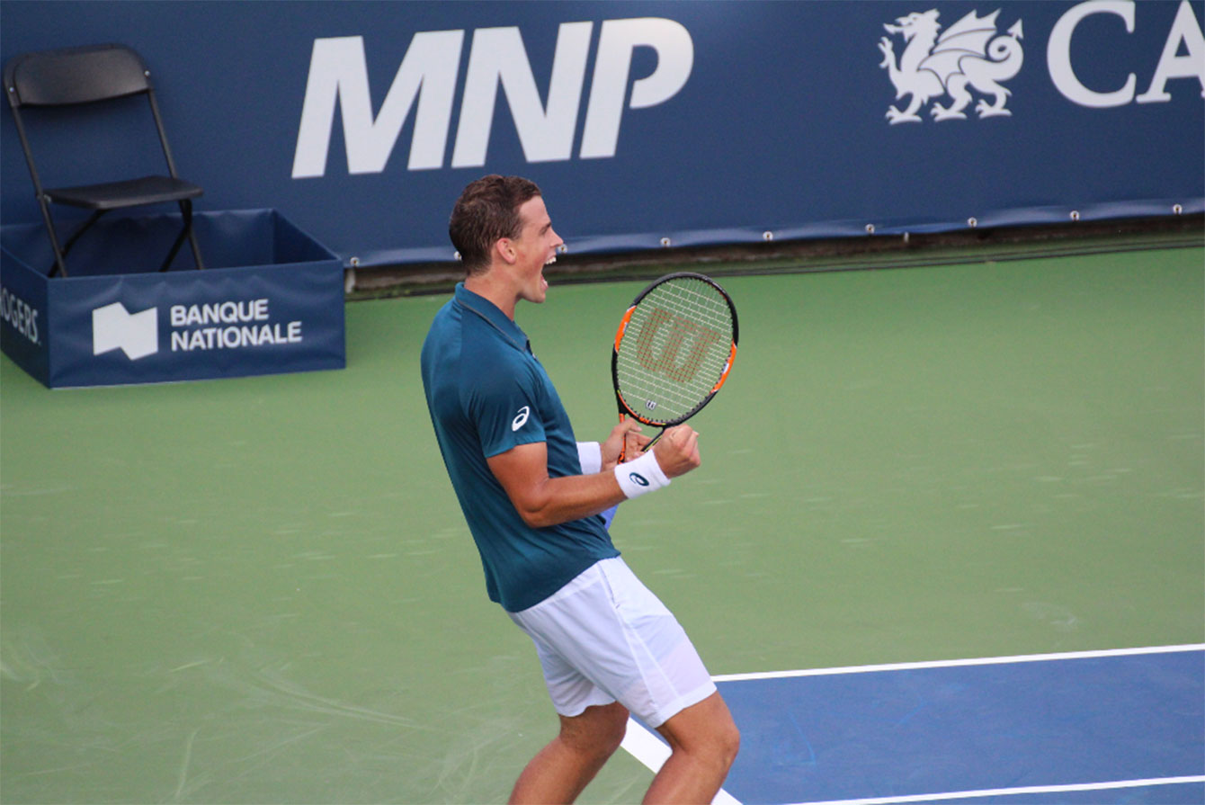Vasek Pospisil reacts during his second round win on Tuesday.