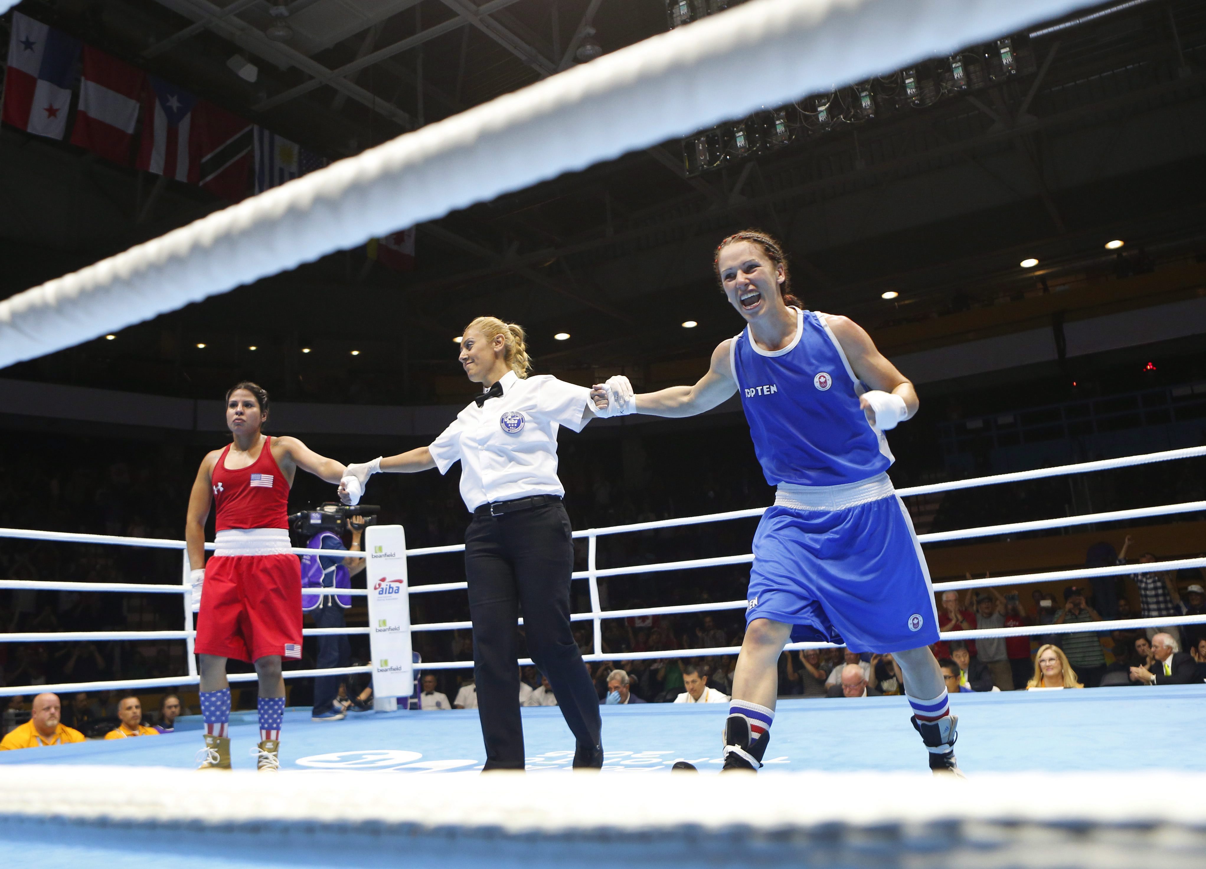 Canada's Mandy Bujold, right, celebrates