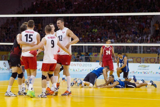 VOL Pan Am 20150726 Members of the Canadian team huddle after winning a point against Puerto Rico