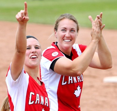 Team Canada players Larissa Franklin and Kaleigh Rafter acknowledge the fan