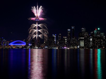Fireworks light up the downtown Toronto city skyline during the closing ceremony for the Pan American Games