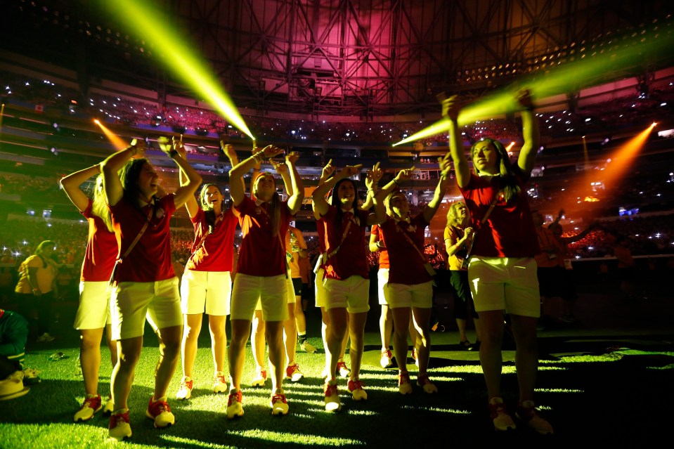 Canadian athletes dance during a performance at the closing ceremony of the Pan Am Games