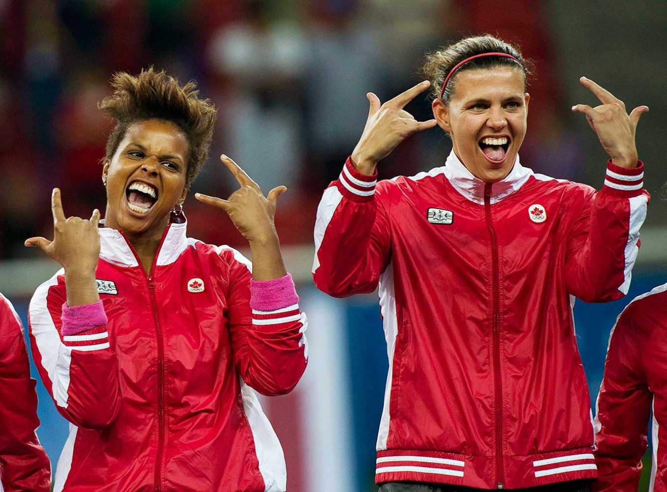 Karina LeBlanc (left) and Christine Sinclair celebrate their 2011 Pan Am gold medal.