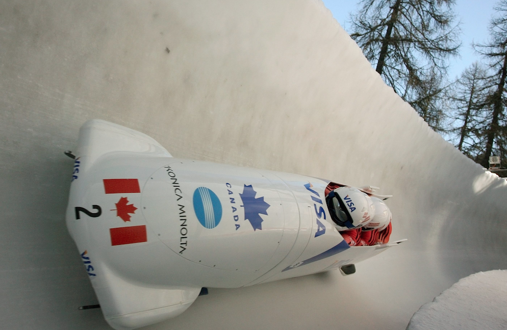Bob Canada 1 with Pierre Lueders, Ken Kotyk, David Bissett and Lascelles Brown runs down the track during the second of four runs of the Four Men Bob World Championship in St. Moritz, Switzerland, Saturday, Feb. 3, 2007. (AP Photo/Eckehard Schulz)