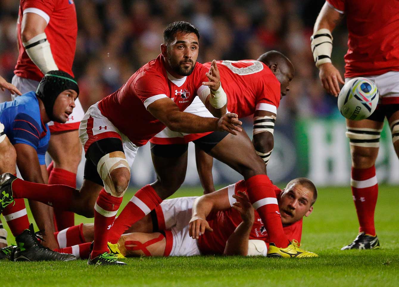 Canada's Phil Mack throws the ball during the Rugby World Cup Pool D match between France and Canada at Milton Keynes, England, Thursday, Oct. 1, 2015. (AP Photo/Matt Dunham)