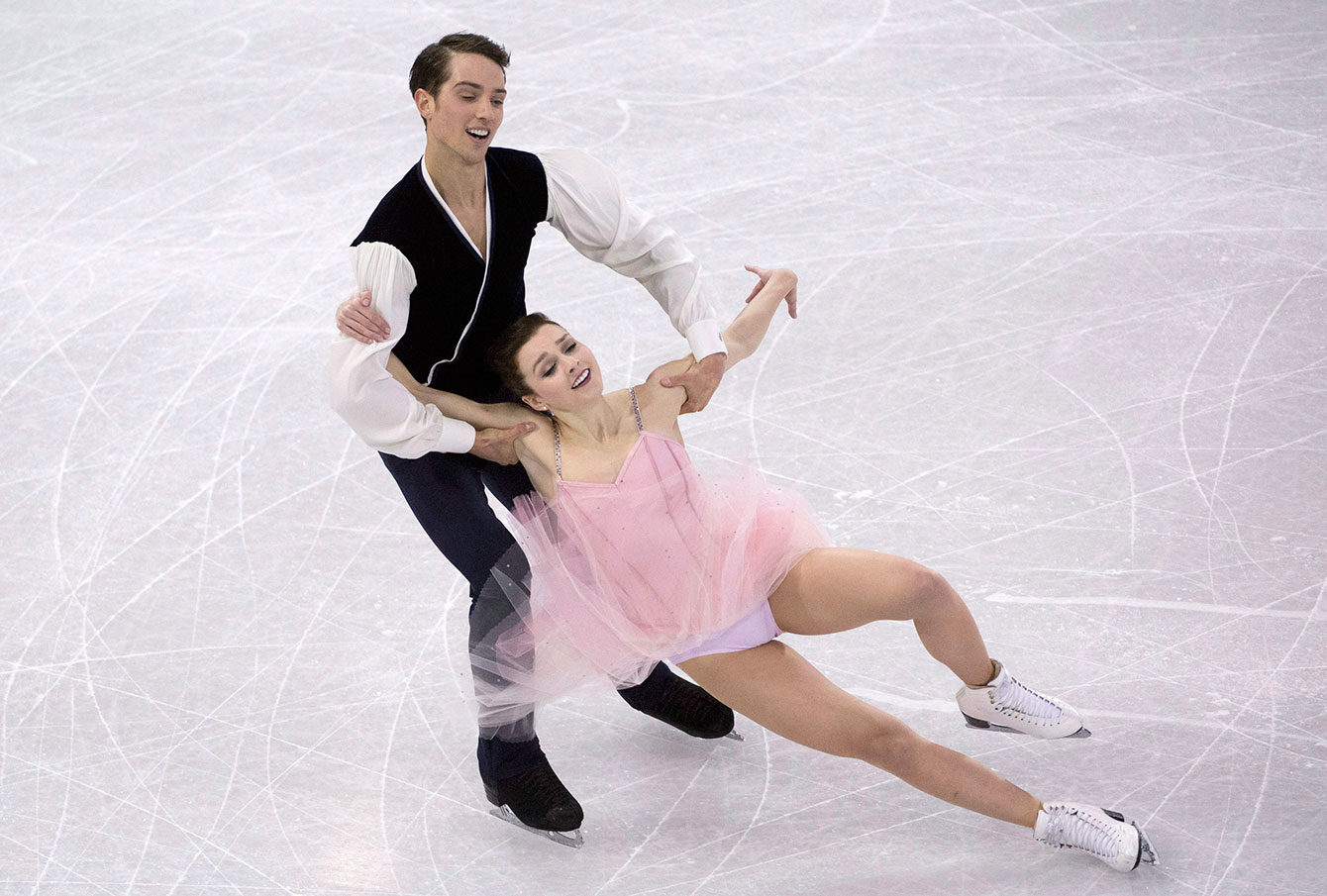 Alexandra Paul and Mitchell Islam in their short program on October 30, 2015 at Skate Canada International. 