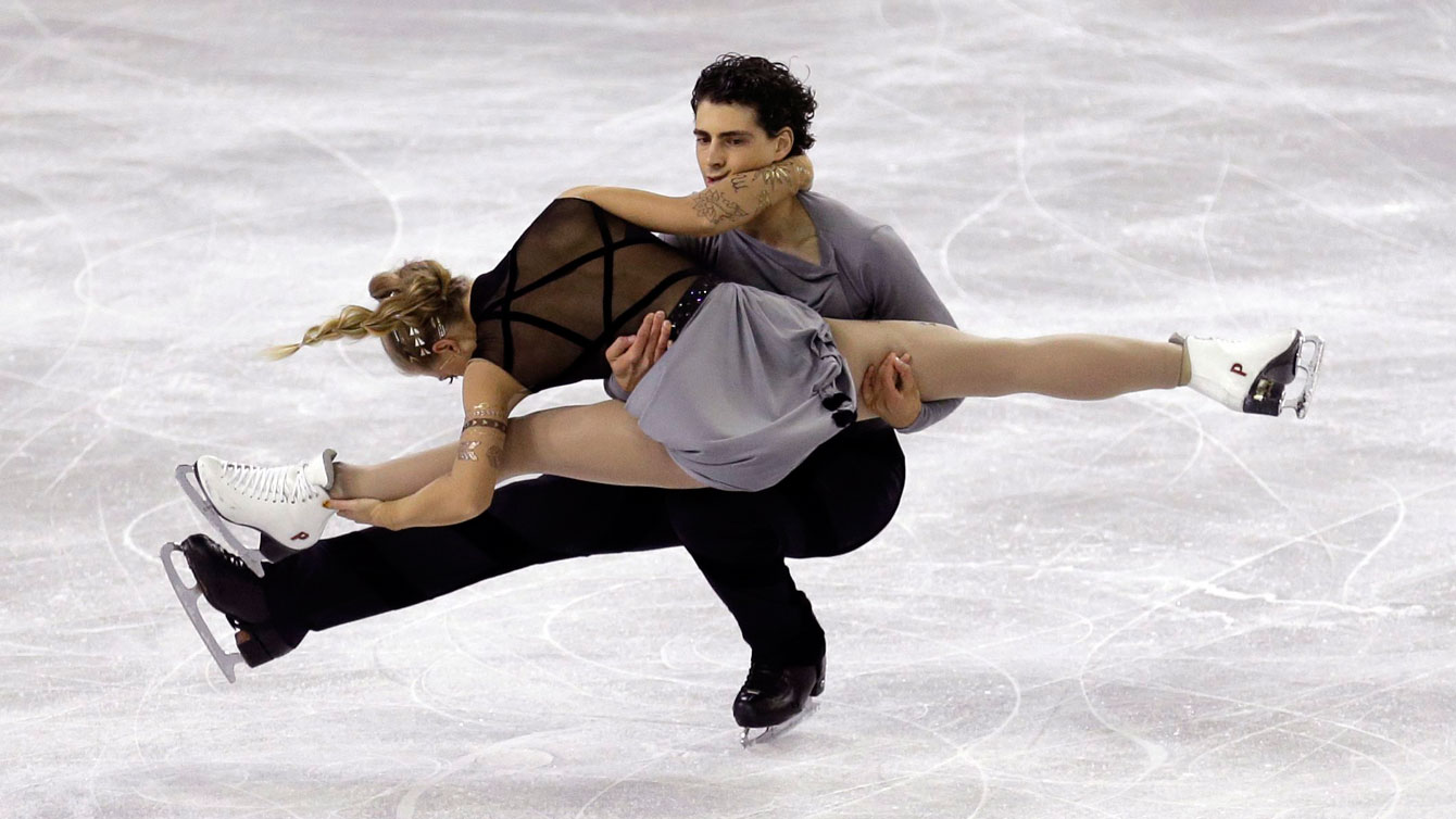 Piper Gilles and Paul Poirier at Skate America on October 24, 2015. 