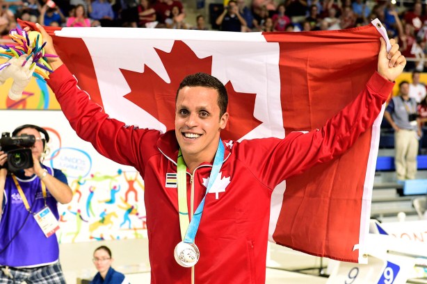 Zack Chetrat celebrates his bronze medal in the 200m butterfly at TO2015 Pan Am Games on July 14, 2015. Chetrat's medal was later upgraded to silver due to a doping infraction to silver medallist Mauricio Fiol of Peru.