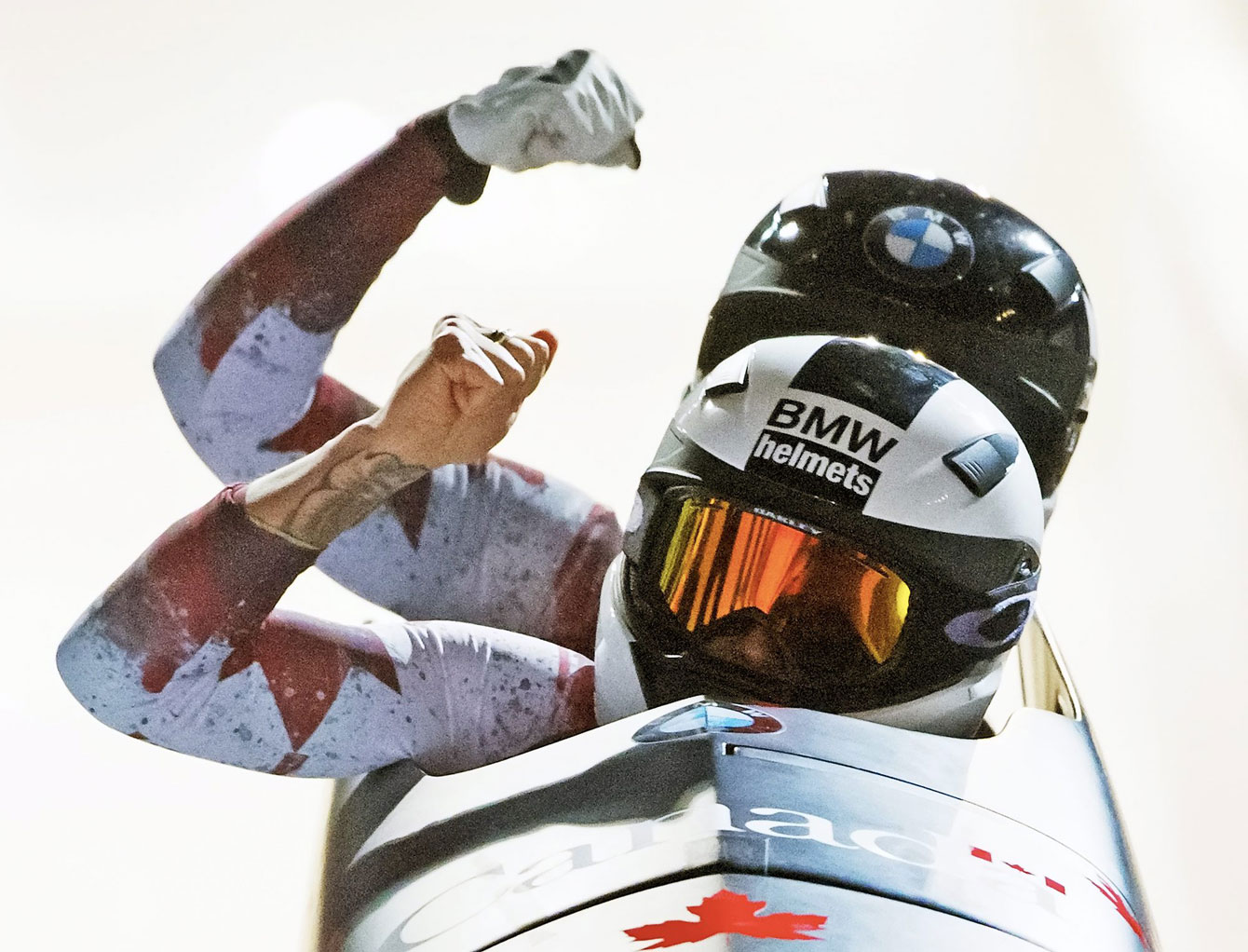 Kaillie Humphries and Melissa Lotholz react after winning the opening race of the 2015-16 bobsleigh World Cup season in Altenberg, Germany on November 27, 2015. 