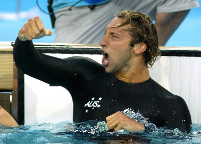Ian Thorpe celebrates his gold medal in the 200m freestyle at Athens 2004. Look at that suit, tho.