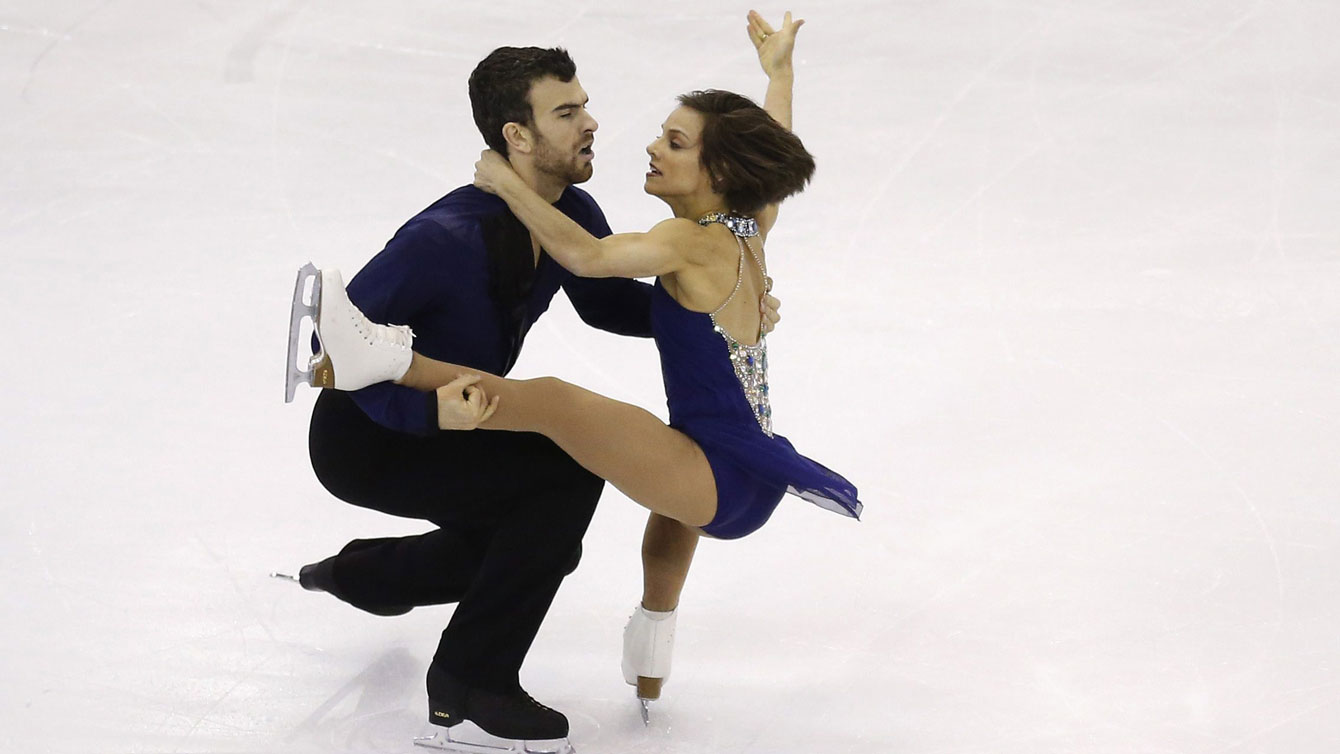 Meagan Duhamel and Eric Radford at the ISU Grand Prix Final during the free skate on December 11, 2015 in Barcelona. 