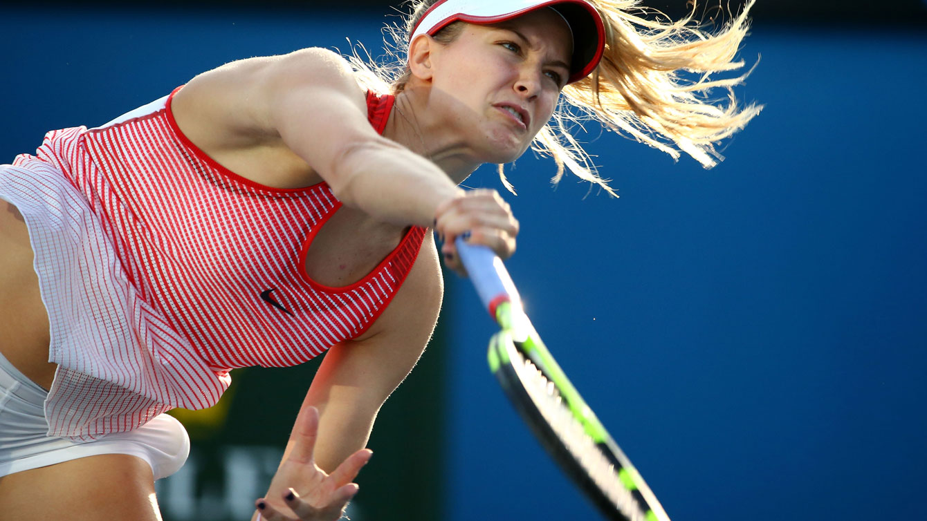 Eugenie Bouchard serves during the first round of the Australian Open on January 18, 2016. 