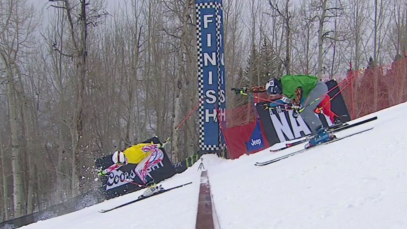 Chris Del Bosco (green bib) extends his arm to beat Alex Fiva of Switzerland for third place at X Games skier x (ski cross) on Saturday, January 30, 2016. 