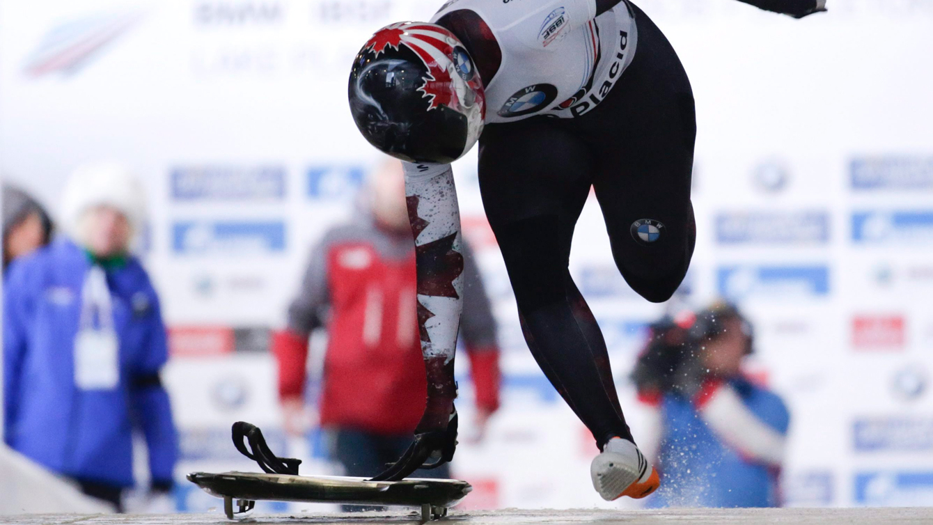Jane Channell of Canada, starts her first run in the women's skeleton World Cup race on Friday, Jan. 8, 2016, in Lake Placid, N.Y. (AP Photo/Mike Groll)