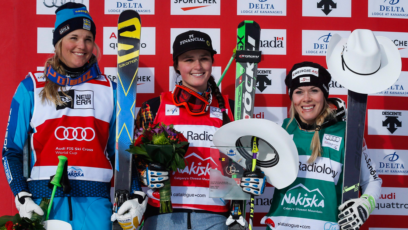 Marielle Thompson, centre, following her first place finish at the women's World Cup ski cross event at Nakiska Ski resort in Kananaskis, Alta., Saturday, Jan. 23, 2016.