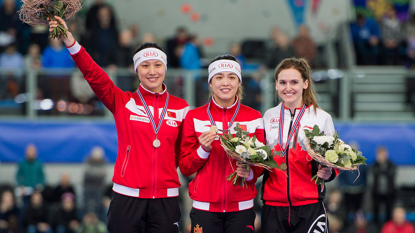 Heather McLean (right) on the World Cup podium following the women's 500m race in Stavanger, Norway on January 30, 2016. 