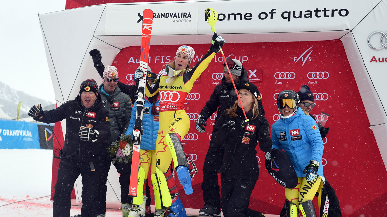 Marie-Michele Gagnon (in yellow) celebrates after winning the women's alpine combined in Andorra on February 28, 2016. 