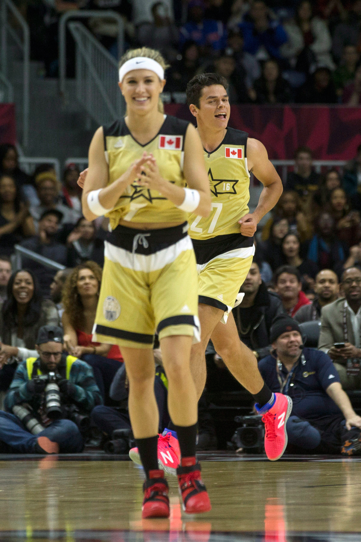 Eugenie Bouchard and Milos Raonic at the NBA All-Star celebrity game on February 12, 2016 in Toronto.