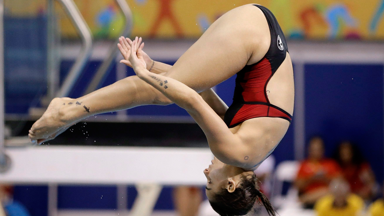 Pamela Ware dives to silver in the women's 3m springboard event at the Pan Am Games on July 12, 2015 in Toronto. (AP Photo/Mark Humphrey)