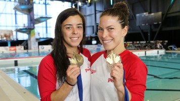 Meaghan Benfeito and Roseline Filion after winning the women's 10 synchro competition at the FINA Diving Grand Prix in Gatineau on April 9. (Greg Kolz)