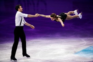 Pairs gold medalists Meagan Duhamel and Eric Radford, of Canada, skate during the exhibition program at the World Figure Skating Championships, Sunday, April 3, 2016, in Boston. (AP Photo/Elise Amendola)