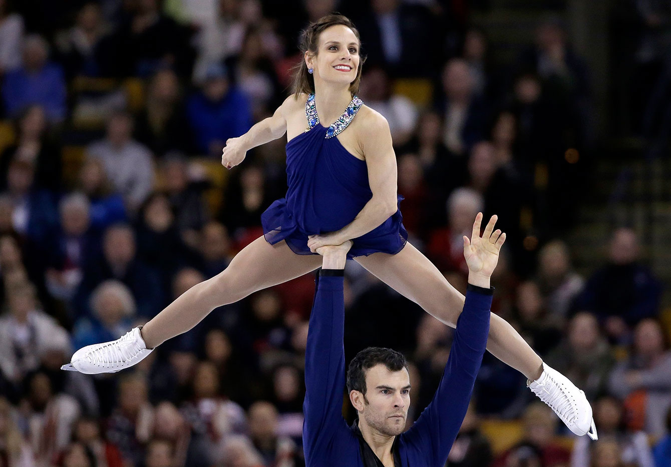 Eric Radford lifts Meagan Duhamel during their free skate at the ISU Speed Skating World Championships on April 2, 2016. 