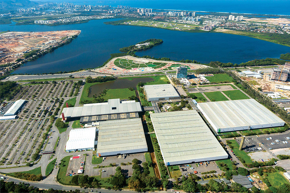 Riocentro from above with the Olympic Park lands before they were fully developed to the left (Photo: riocentro.com.br). 