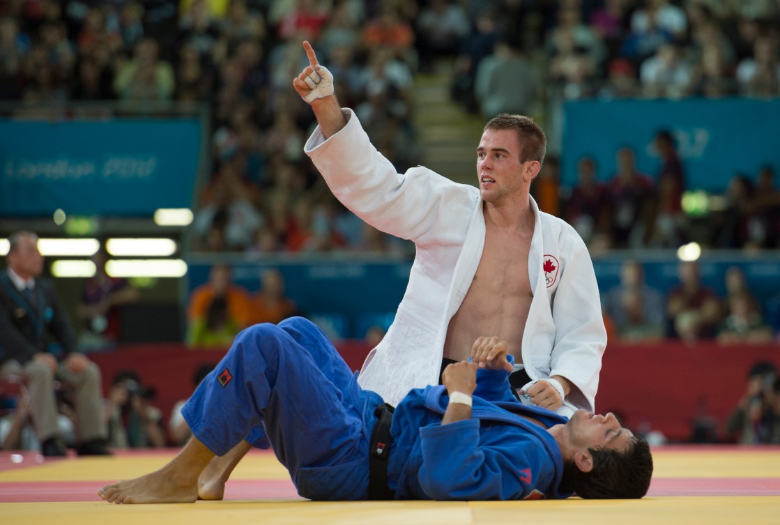 Canada's Antoine Valois-Fortier battles withTravis Stevens of the USA at the 2012 London Olympics, on July 31, 2012. Valois-Fortier beat Stevens to win a bronze medal in judo. THE CANADIAN PRESS/HO, COC - Jason Ransom