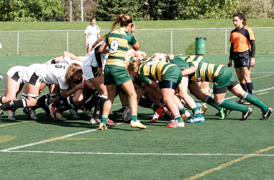 Rose LaBreche refereeing a CIS match between Carleton and Sherbrooke.