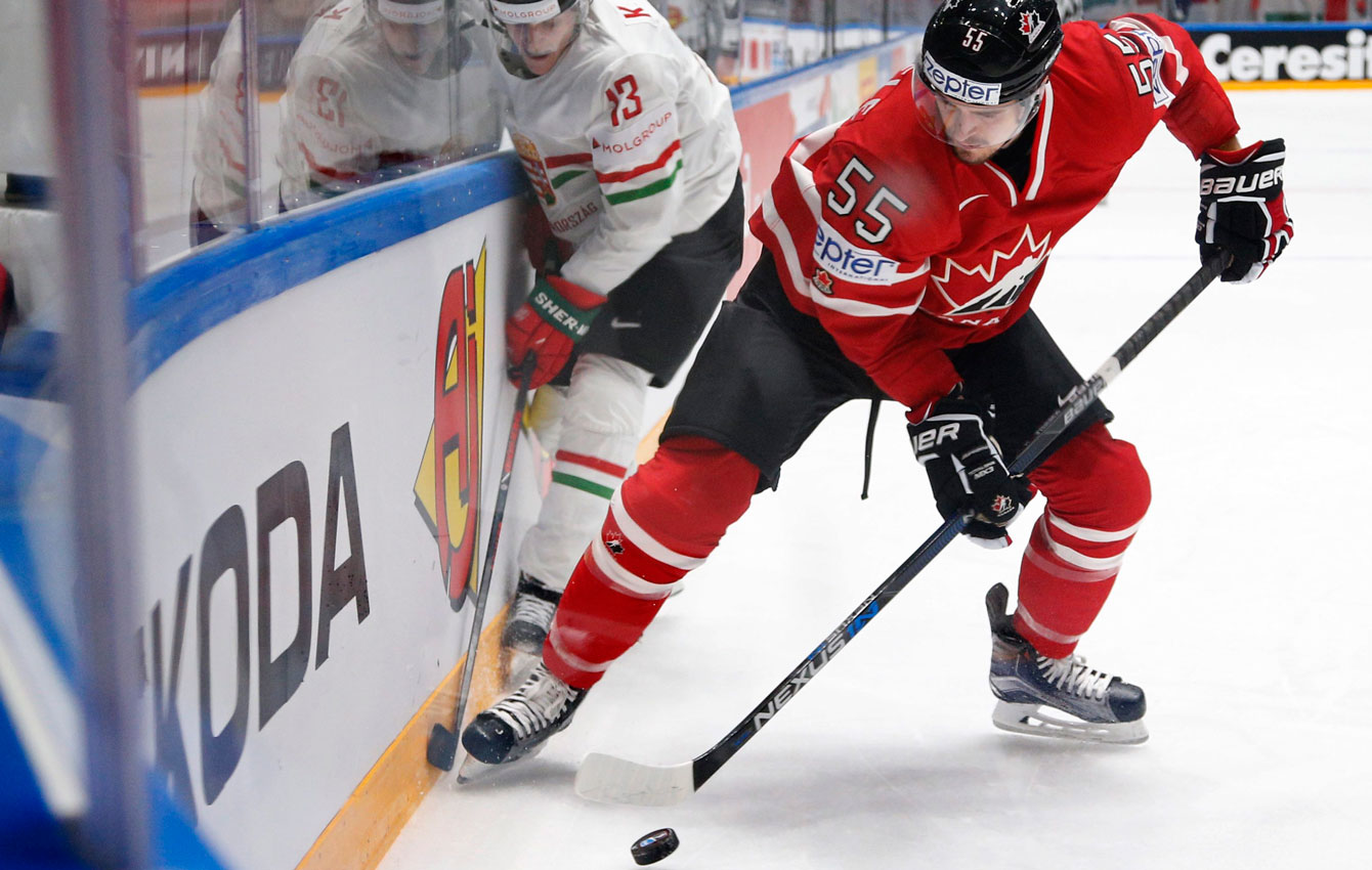 Mark Scheifele fights for the puck at the Hockey World Championships in St. Petersburg, Russia on May 8, 2016. (AP Photo/Dmitri Lovetsky)