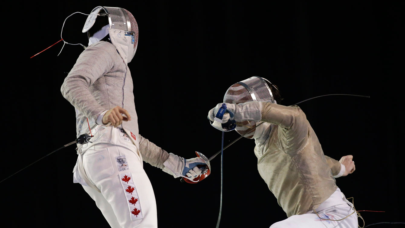 Joseph Polossifakis (left) competes at the TO2015 Pan Am Games on July 23, 2015. 