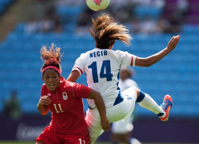Canada's Desiree Scott, left, fights for the ball against Canada's Desiree Scott during their bronze medal women's soccer match at the 2012 London Summer Olympics, Thursday, Aug. 9, 2012 at the Ricoh Arena Stadium in Coventry, England. (AP Photo/Jon Super)