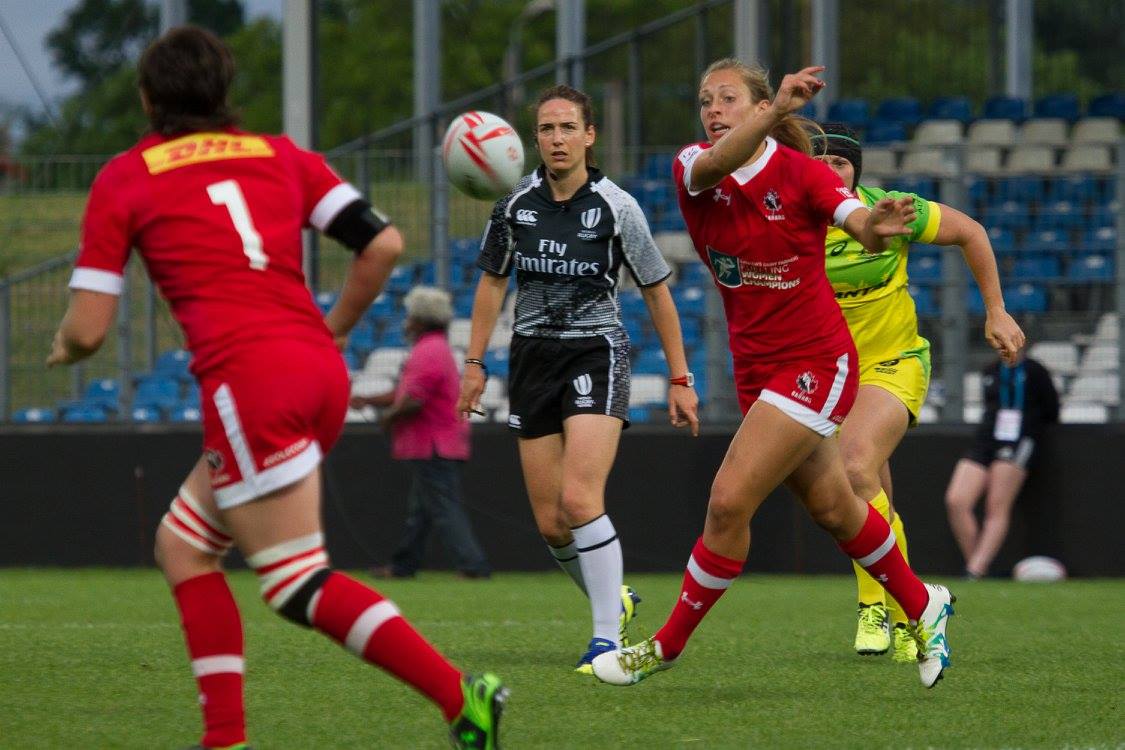 Megan Lukan makes a pass to Britt Benn in a match at Canada Sevens in April 2016 (Photo: Rugby Canada).