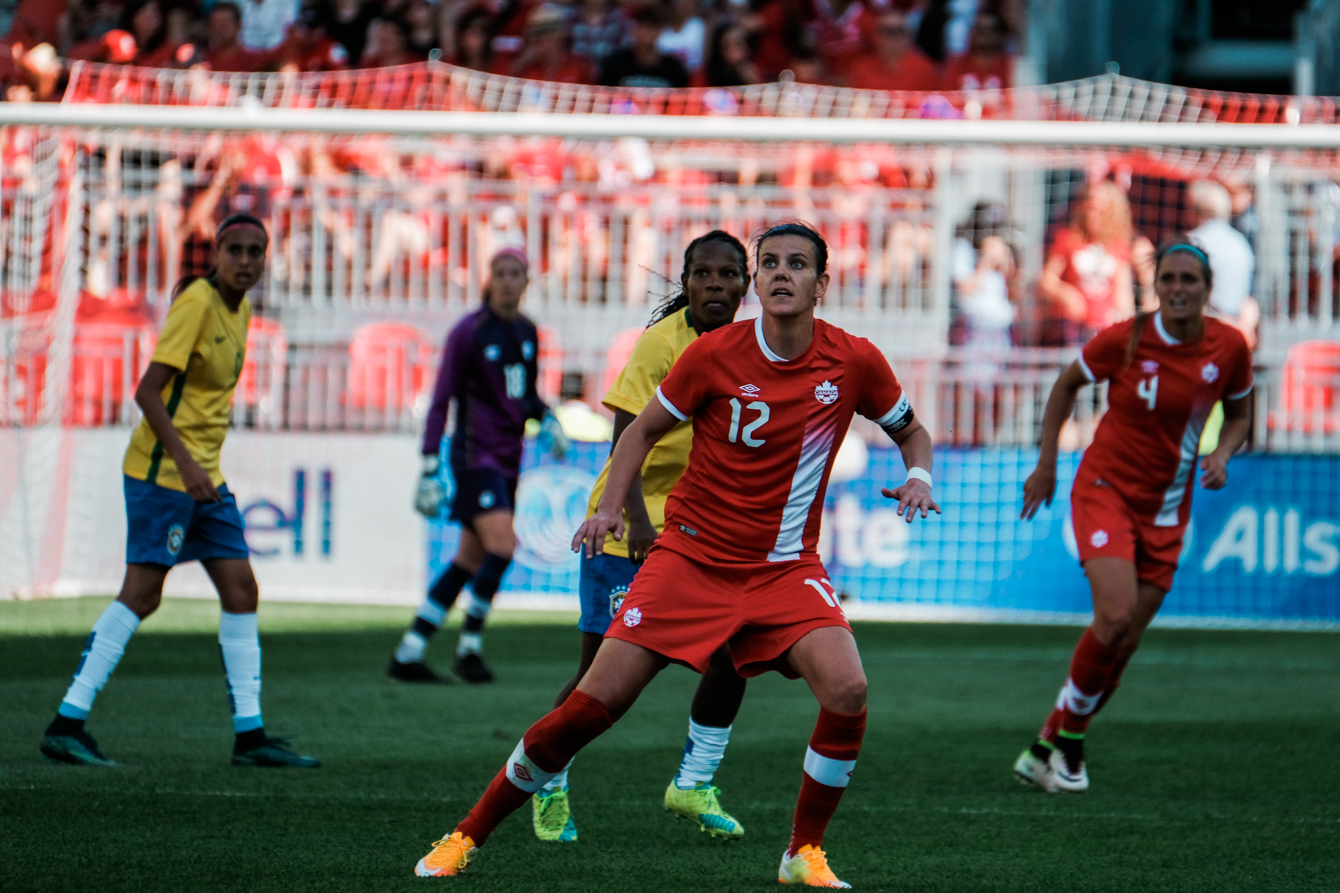 Christine Sinclair (in red) captained Canada and played 74 minutes against Brazil on June 4, 2016. (Thomas Skrlj/COC)