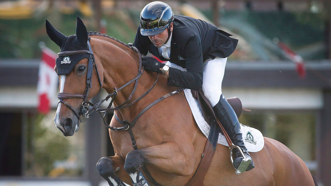 Eric Lamaze and Fine Lady 5 compete at Spruce Meadows in Calgary on June 9, 2016. (Jeff McIntosh)